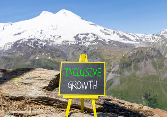 Inclusive growth symbol. Concept words Inclusive growth on beautiful black chalk blackboard....