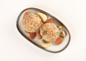 Dry fruits Laddu Indian sweet dry fruits and nuts laddu, which is a traditional, healthy, nutritious and popular dish, is made from items like dates, raisins, almonds, cashew nuts and flaxseeds