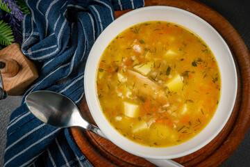 Barley soup with vegetables and chicken.