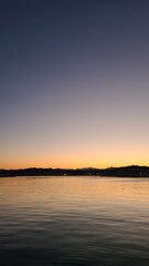 Obraz premium sunset over the river