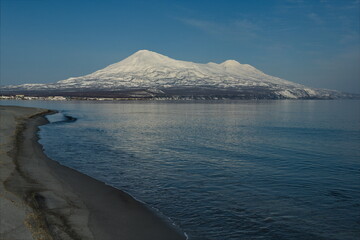 Russia. The Far East, the Kuril Islands. View of the cold expanse of the Sea of Okhotsk against the...