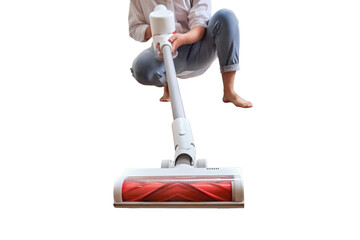 Woman with a wireless portable vacuum cleaner in the kitchen, isolated on a white background....