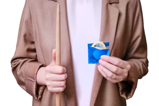 Woman teacher holding a condom in her hands on a isolated on a white background, close-up