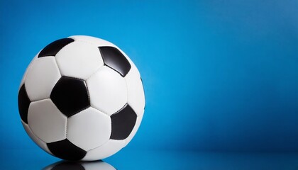 Naklejka premium Soccer ball Isolated, blue background, text space 