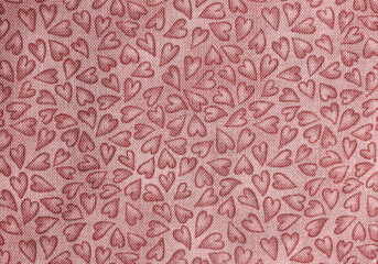 A red heart pattern cotton fabric closeup
