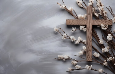 wooden Christian cross, dry plant branches with thorns and leaves on grey snowy background top view - obrazy, fototapety, plakaty