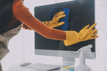 Office Cleaning Service. Janitor Spraying Desk. Workplace Hygiene
