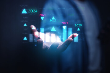 2024 business concept, businessman or engineer Show the trend of driving digital currency to develop online business.	
