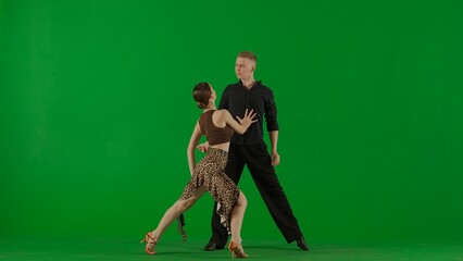 Elegant Ballroom Dance Couple in Action chroma key.