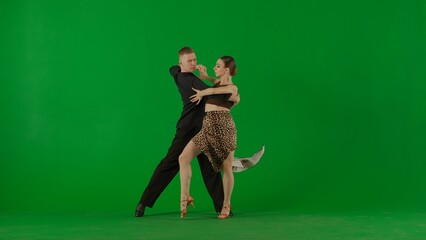 Elegant Ballroom Dance Couple in Action chroma key.