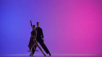 Elegant Ballroom Dance Couple on a neon background