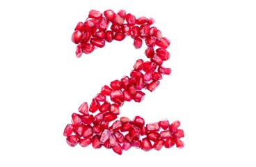 Two or 2 Number Written with Pomegranate Seeds Isolated on White Background