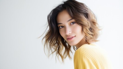 Beauty portrait of young Asian women on light and shadow background