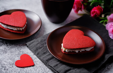 Red velvet whoopie pies in the form of heart for Valentine's day in a plate