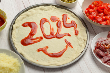 The year 2024 crafted with tomato sauce on a pizza in the making, celebrating the New Year with...