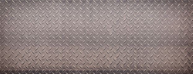 shiny metal texture with diamond pattern. stainless steel background