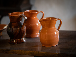 The old clay jugs on table