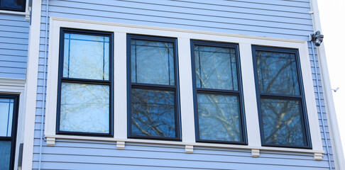 Suburban house, symbolizing increasing mortgage rates and inflation impact on real estate market