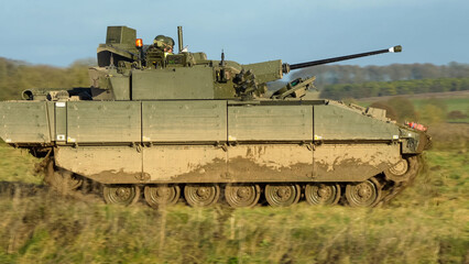 British army General Dynamics Ajax Reconnaissance and Strike armoured fighting vehicle (AFV), tank in action. Wilts UK