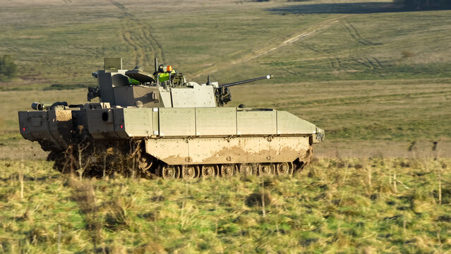 British army General Dynamics Ajax Reconnaissance and Strike armoured fighting vehicle (AFV), tank in action. Wilts UK