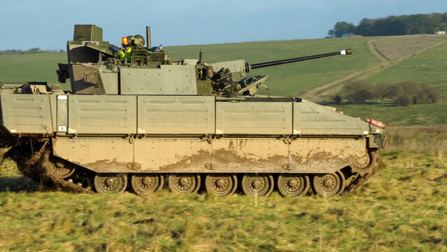 British army General Dynamics Ajax Reconnaissance and Strike armoured fighting vehicle (AFV), tank in action. Wilts UK
