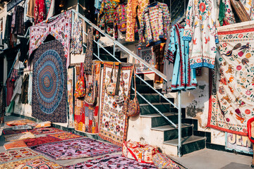 carpets are on sale at udaipur street, india
