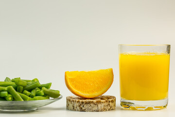 Orange slices and orange juice for a healthy diet