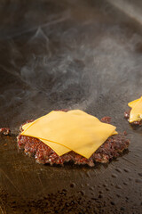 smash burger cheese cooking