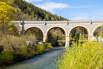 Historical railway viaduct over river Schwarza in Payerbach, Austria as part of the famous mountain...