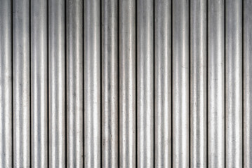 Obraz premium Set of paraller aluminum tubes as industrial background