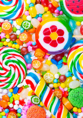 Fototapeta na wymiar Colorful candies on the white background