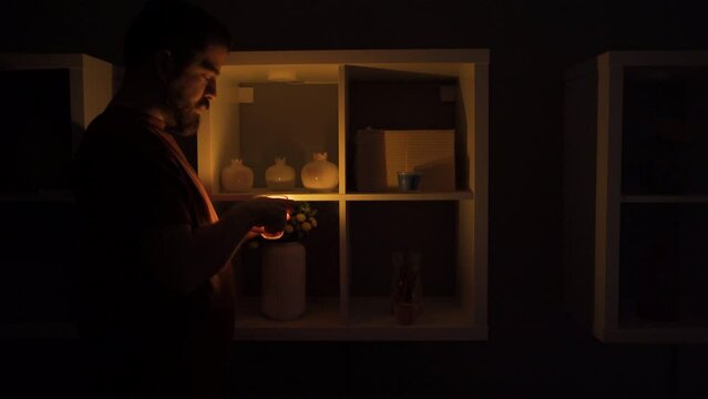 Lighting a candle, power outage.