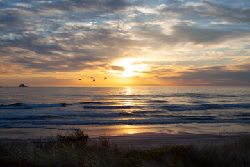 A spectacular and colorful sunset on Southern Oregon's Adventure Coast along historic and scenic Highway 101 in Gold Beach Oregon.