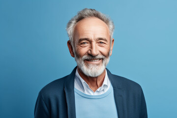 Obraz premium medium shot portrait photography of a pleased man in his 70s against a light blue background