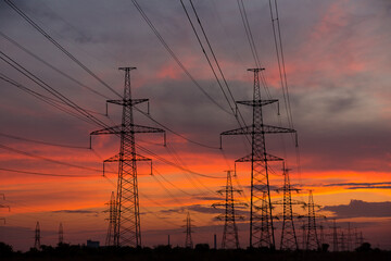 Orange sunset and power lines, high voltage power line
