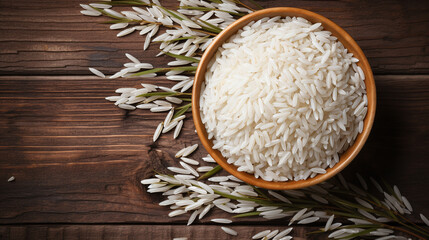 Top view of white rice in wooden bowl.