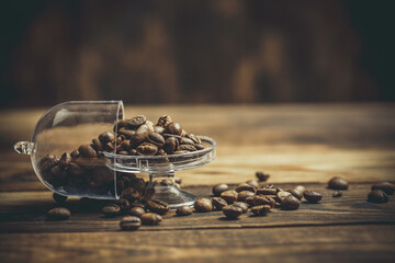 Aromatic coffee beans on a wooden table, coffee beans
