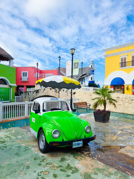 Mexico, Cancun, La Isla, old green Volkswagen