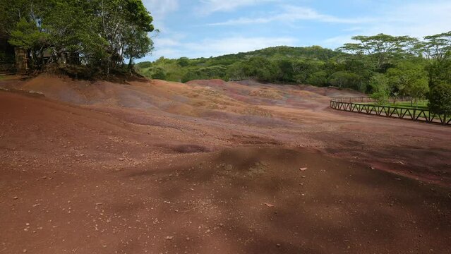 Exploring the Seven Colored Earths of Chamarel through immersive handheld footage that highlights the unique volcanic pigments and mesmerizing layered dunes of Mauritius&rsquo; famous geological site.