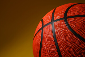 Fototapeta premium Basketball ball on color background, closeup. Space for text