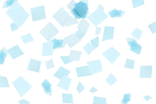 Bright confetti falling on white background. Party supply © New Africa