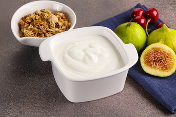 Traditional homemade Greek yoghurt with granola