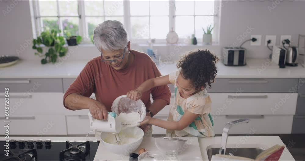 Poster Grandmother and child baking, cooking and making a cake, dessert and homemade cookies or biscuits in a home kitchen. Cute, fun and little girl helping senior with mixing pouring flour while bonding