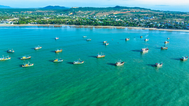Aerial view of sea Mui Ne, Vietnam see the whole bay of Ke Ga from north to south shore very large with sea waves, ships, reefs is tourism potential Status of Vietnam.