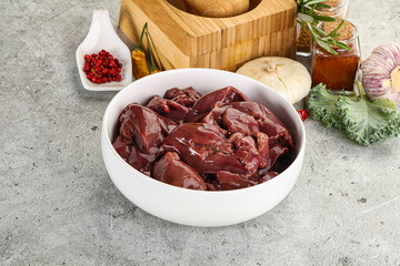 Raw uncooked chicken liver in the bowl