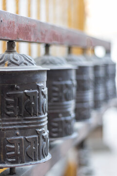 Prayer wheels is spun by devotees to aid for meditation and accumulating wisdom, good karma and putting negative energy aside