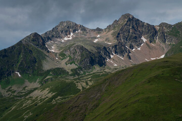 Fototapeta premium View of Goryachev rocks near the ski resort village of Arkhyz on a sunny summer day, North Caucasus, Karachay-Cherkessia, Russia