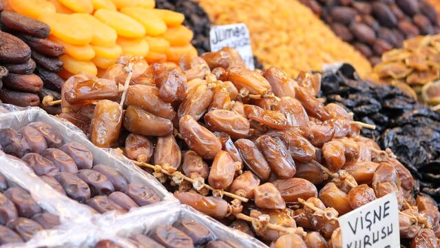  many date fruits display for sale at local market 