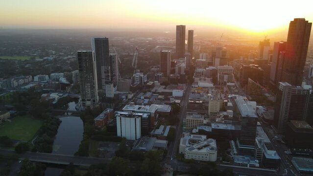 Aerial drone view of Parramatta cbd in Sydney, NSW Australia during a morning sunrise in December 2023