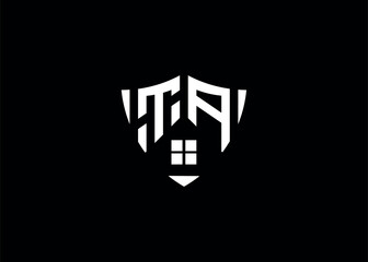 Real estate letter TA shield shape logo and house building vector template